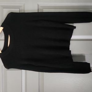 Black Tahari knitted sweater. No size on tag I would say xs